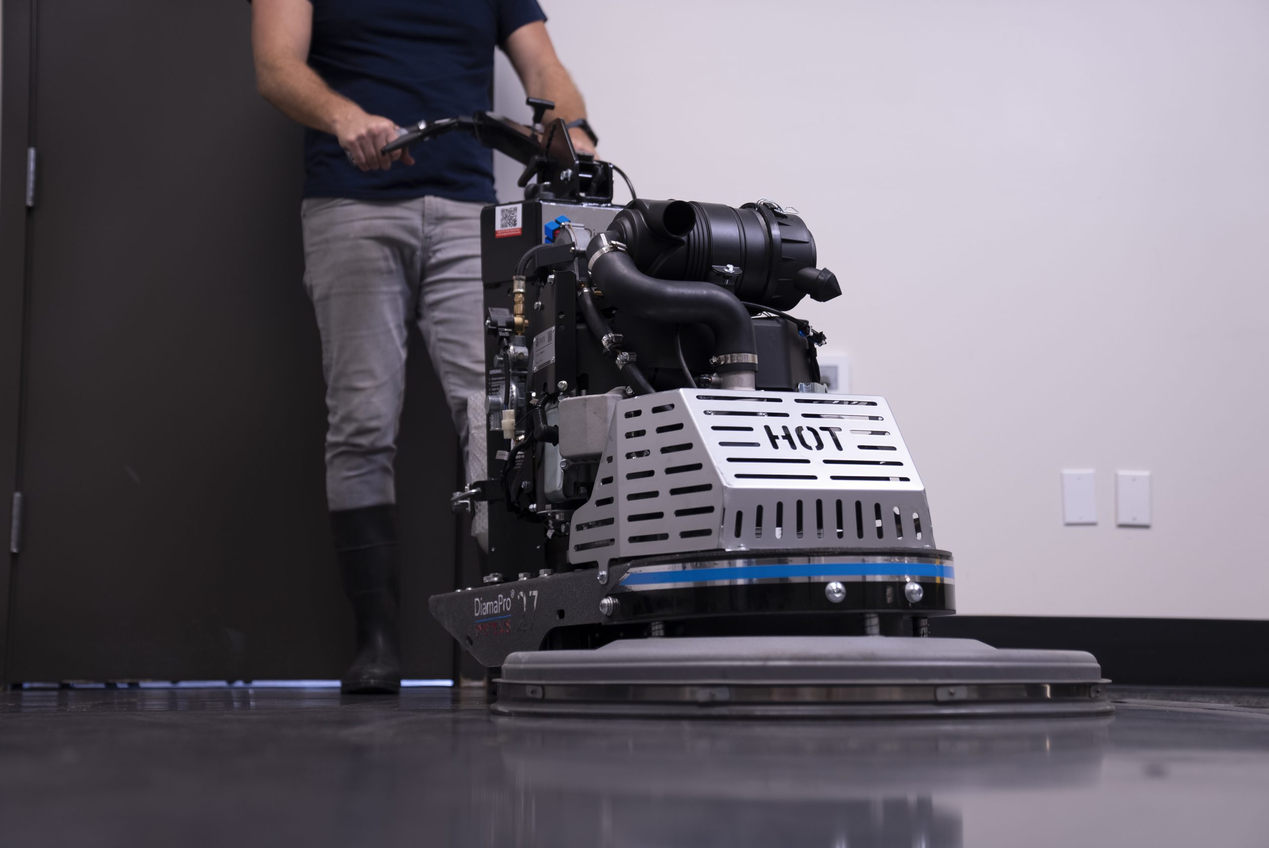 Floor machine restoring a hard floor Floor machine restoring a hard floor